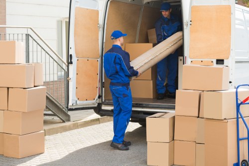 Urgent same day removals service in South Kensington with movers ready to load a van