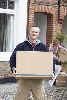 Office removals planning in South Kensington with moving boxes and workspace setup