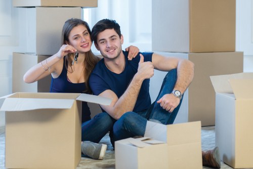 Flat removals planning in South Kensington with moving boxes and apartment access