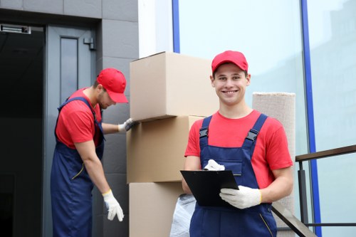 Professional man with van handling apartment relocation in South Kensington