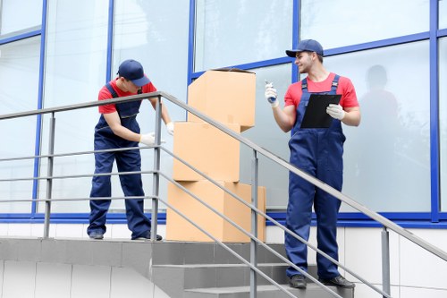 House removalists in Southkensington loading furniture into a moving truck