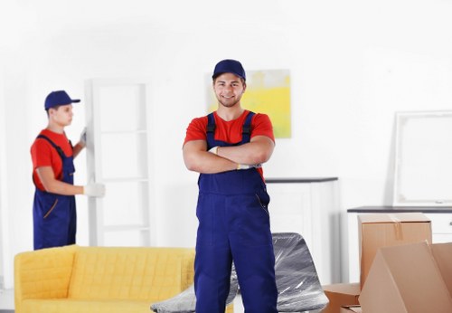Packed boxes and furniture ready for local house or flat removals