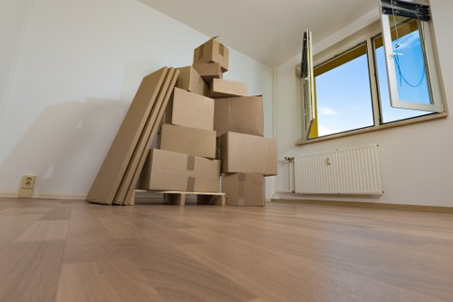 Careful loading of boxes and furniture for a student move in South Kensington