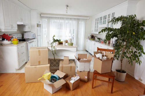 Moving house logistics in South Kensington with packing boxes