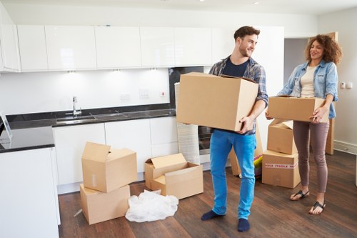 Professional movers loading belongings in a South Kensington street
