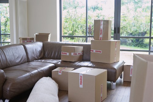 Careful packing of fragile household items in South Kensington moving service
